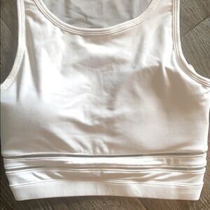 White lightly padded sports bra XS